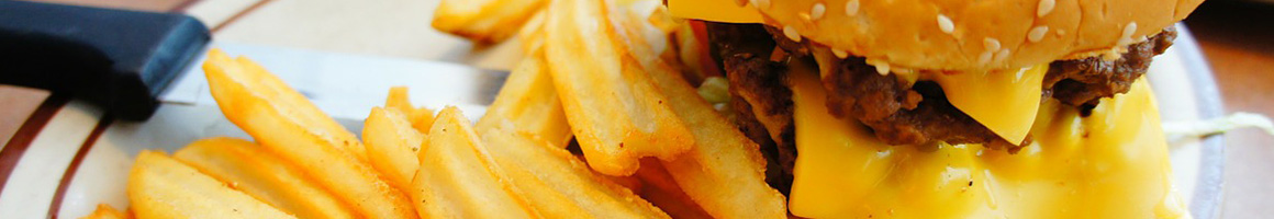 Eating Burger Fast Food at Bigg Burger restaurant in Livonia, MI.